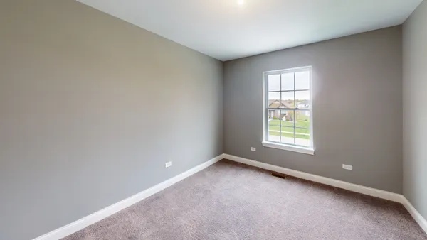an empty room with a window