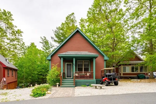 a car parked in front of a house