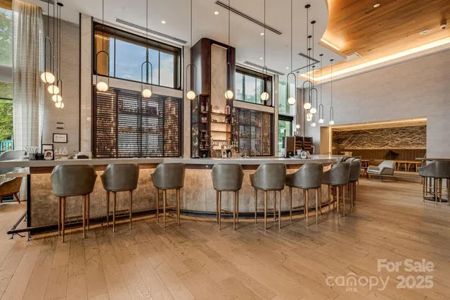 a view of a chairs and table in a patio