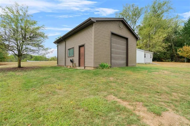 a view of a chairs and table in patio