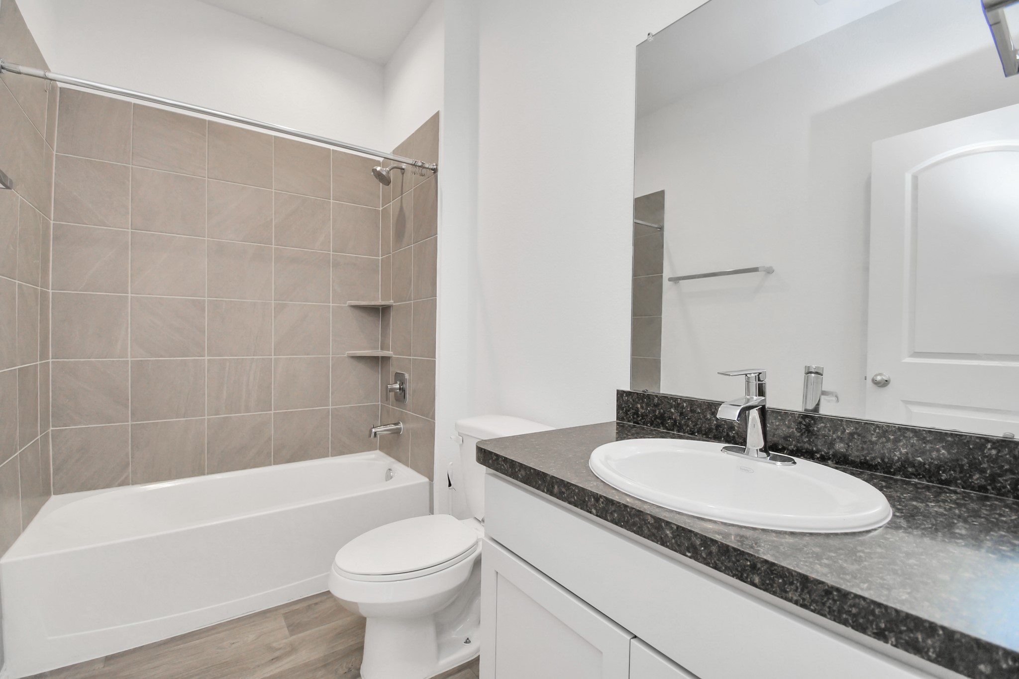 5443 Pinetree Crescent Ln Spring Spring, TX 77373 - Photo 32 of 43 a bathroom with a sink toilet a bathtub and a shower