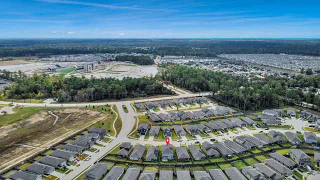 a view of a swimming pool with a yard
