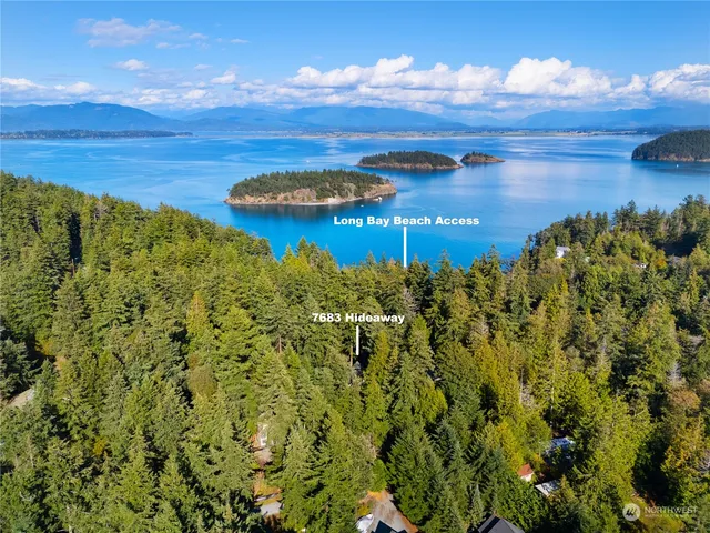 a view of a lake in a field