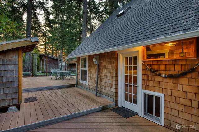 a porch with seating space and yard