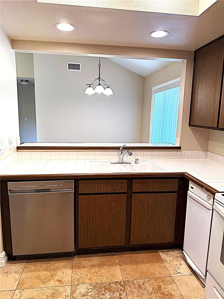 545 South Ranch View Circle, Unit 97 Anaheim Hills, CA 92807 - Photo 16 of 33 a close view of sink and mirror