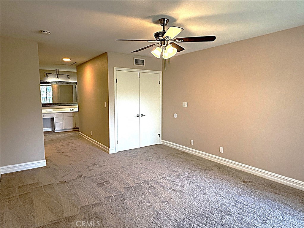 545 South Ranch View Circle, Unit 97 Anaheim Hills, CA 92807 - Photo 2 of 33 a view of an empty room and a bathroom