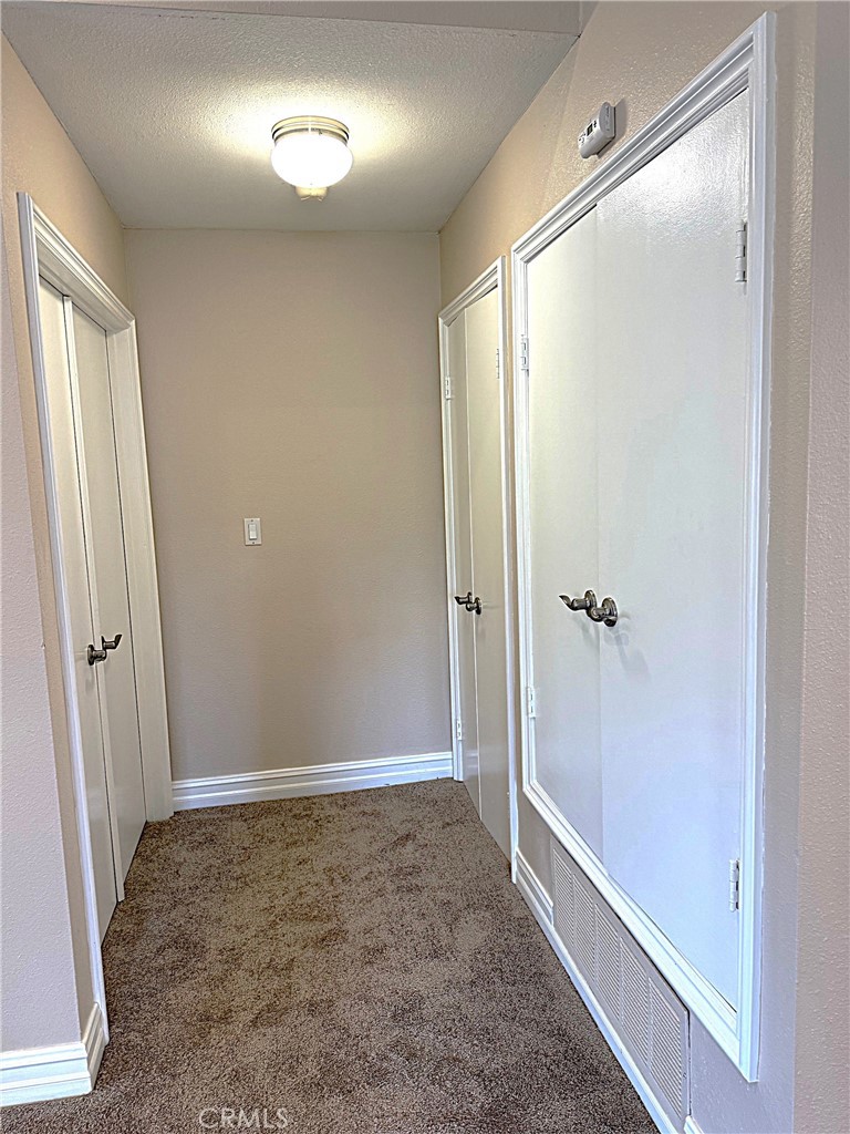 545 South Ranch View Circle, Unit 97 Anaheim Hills, CA 92807 - Photo 22 of 33 a view of room with hallway and closet