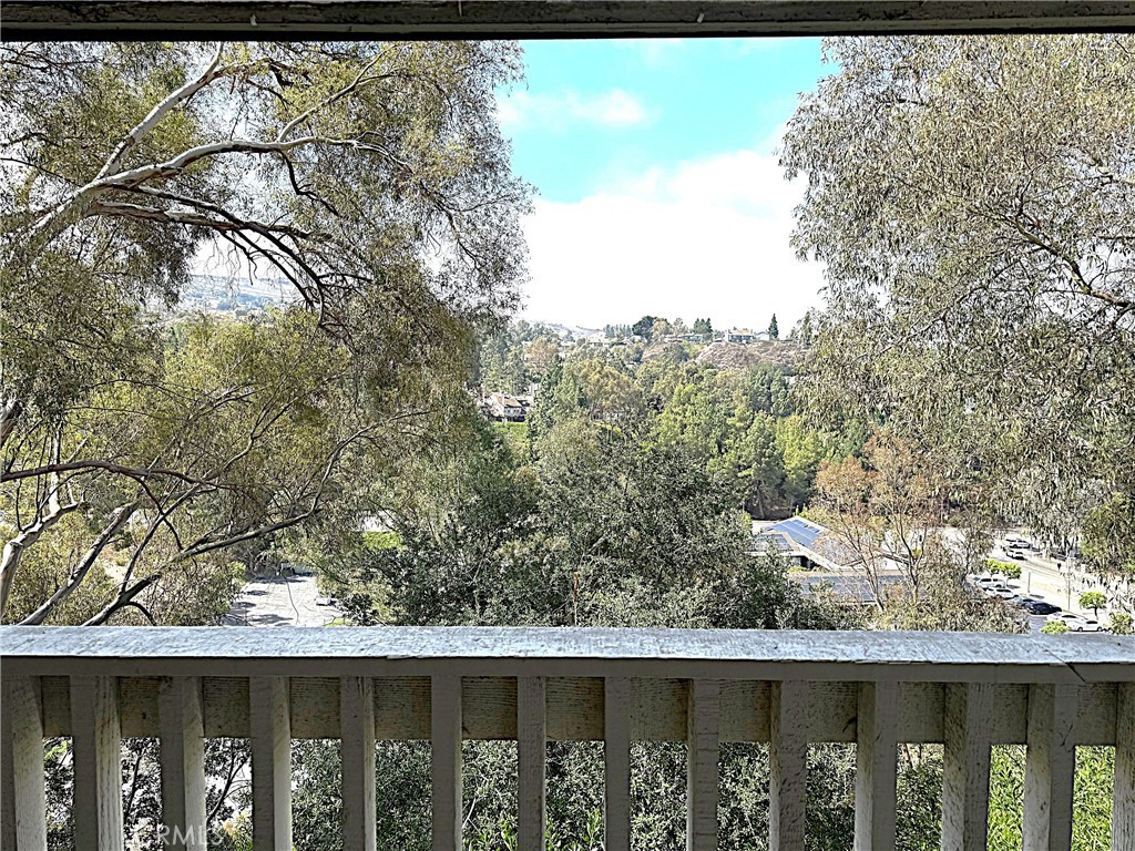 545 South Ranch View Circle, Unit 97 Anaheim Hills, CA 92807 - Photo 32 of 33 a roof deck with wooden fence