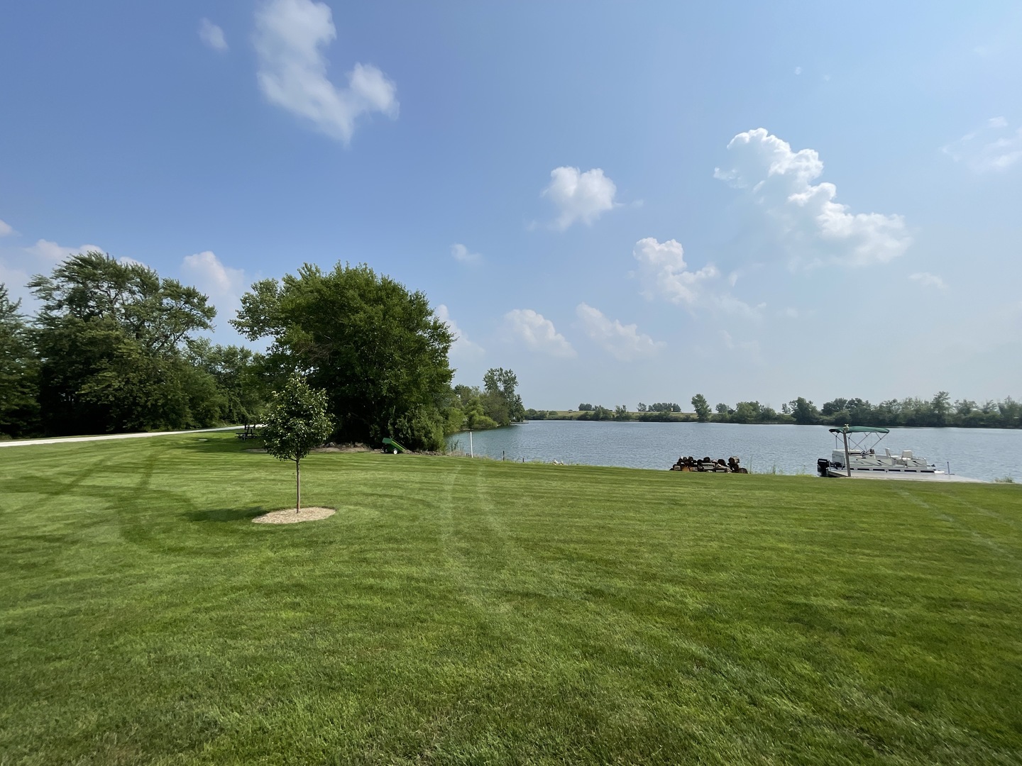 4 Moss Lake Road Farmer City, IL 61842 - Photo 2 of 12 a view of a lake