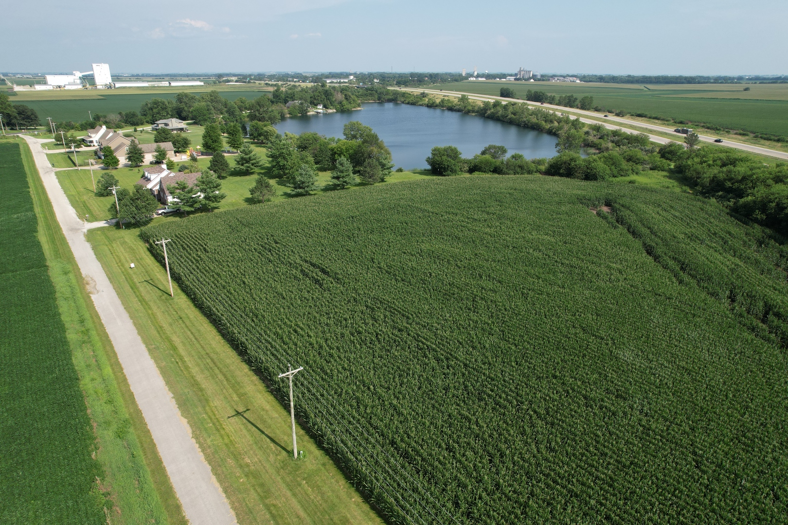 4 Moss Lake Road Farmer City, IL 61842 - Photo 10 of 12 a view of a lake with a city