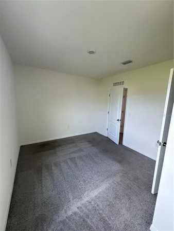 an empty room with a bench