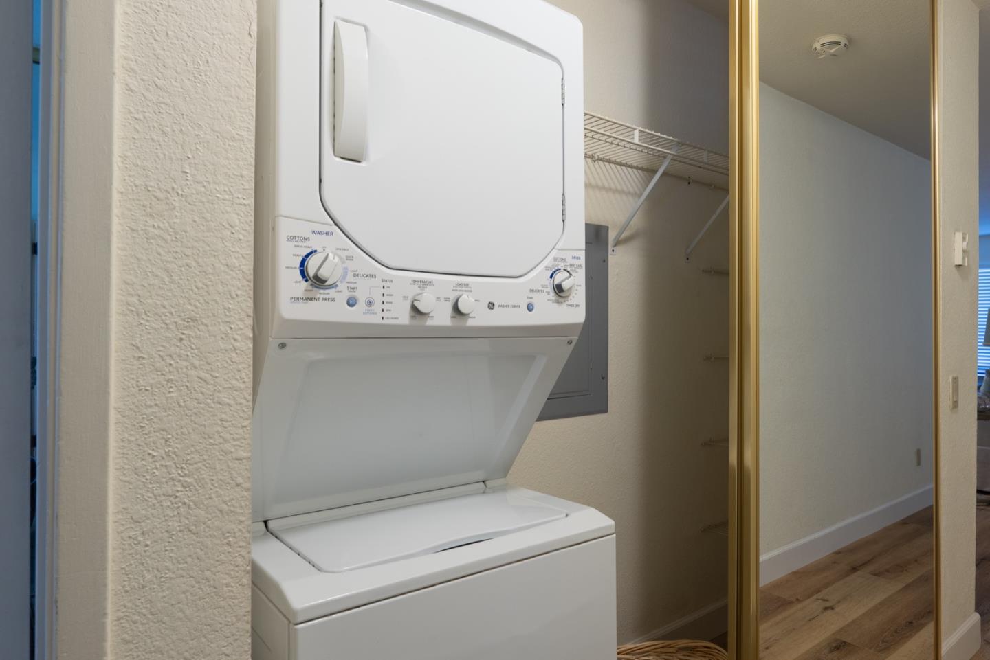 1 Surf Way, Unit 125 Monterey, CA 93940 - Photo 18 of 36 a close up view of a bathroom with a sink and a mirror