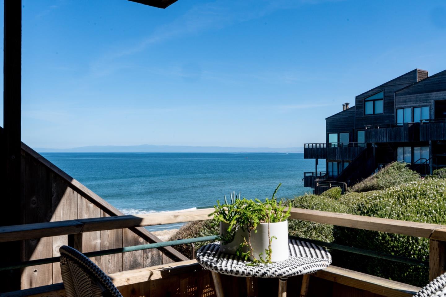 1 Surf Way, Unit 125 Monterey, CA 93940 - Photo 2 of 36 a view of a roof deck with couches