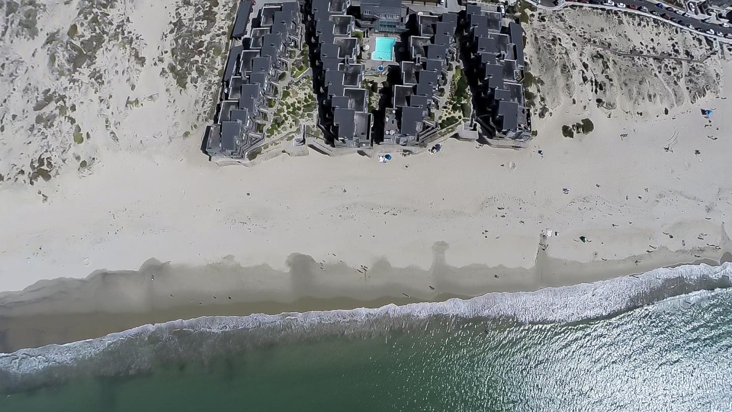 1 Surf Way, Unit 125 Monterey, CA 93940 - Photo 24 of 36 a view of a wooden floor with a lake view