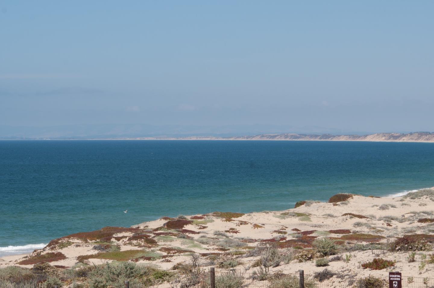 1 Surf Way, Unit 125 Monterey, CA 93940 - Photo 35 of 36 a view of ocean with beach