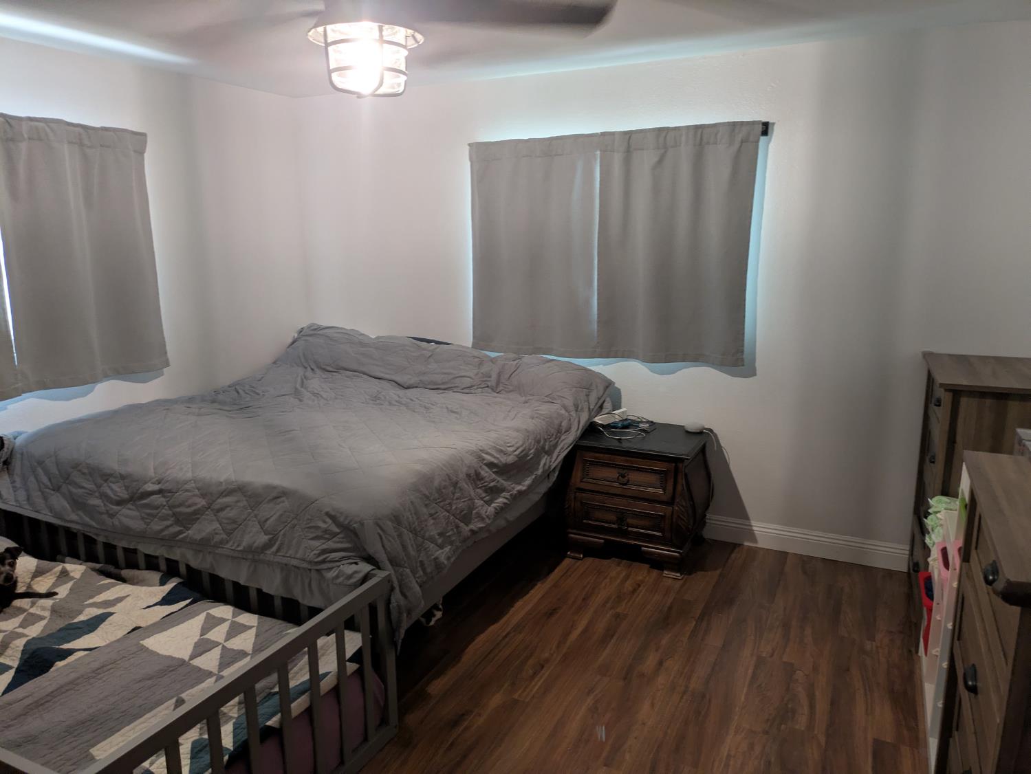 25931 Thornton Road Thornton, CA 95686 - Photo 15 of 31 a bedroom with a bed and a dresser