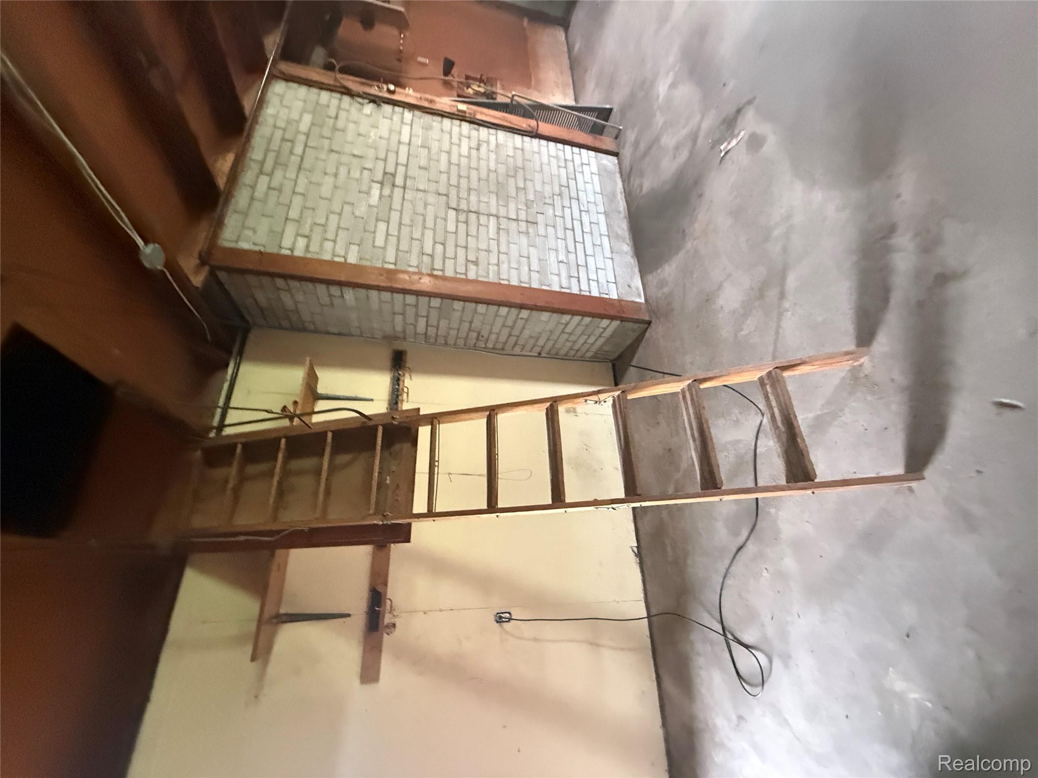 3176 East Fisher Road Bay City, MI 48706 - Photo 16 of 25 Misc room with unfinished concrete floors