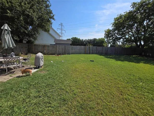 a fire hydrant in the middle of a field
