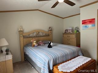 115 Winding Wood Road Hopewell Junction, NY 12533 - Photo 4 of 17 a bedroom with a bed and wooden floor