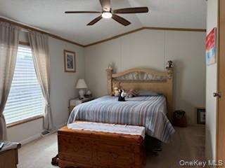 115 Winding Wood Road Hopewell Junction, NY 12533 - Photo 5 of 17 a bedroom with a bed and window