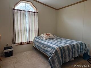115 Winding Wood Road Hopewell Junction, NY 12533 - Photo 7 of 17 a bedroom with a bed and a window