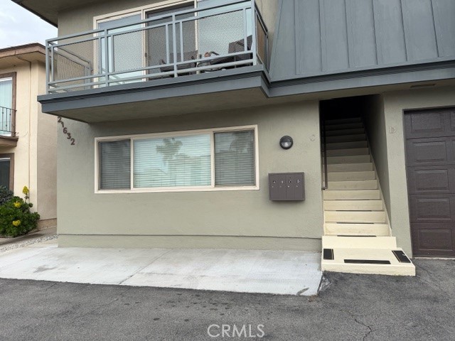 21632 Brookhurst Street, Unit B Huntington Beach, CA 92646 - Photo 4 of 17 a front view of a house with entryway