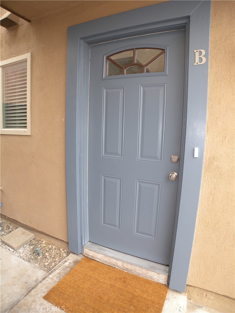 21632 Brookhurst Street, Unit B Huntington Beach, CA 92646 - Photo 6 of 17 a view of front door