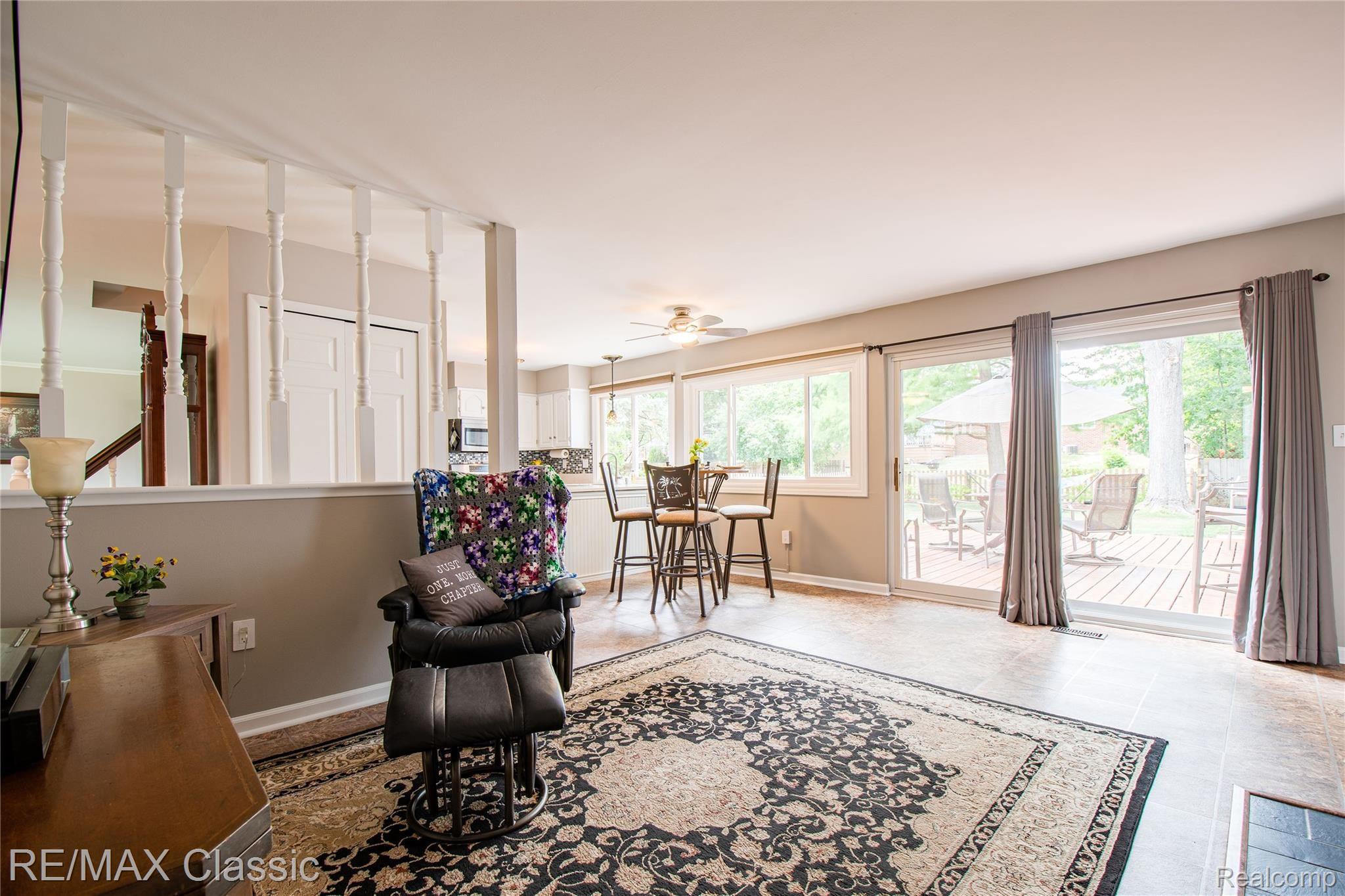 22715 Shadowpine Way Novi, MI 48375 - Photo 14 of 34 Family room with direct access to outdoor living