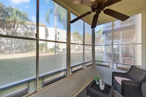 a living room with glass windows