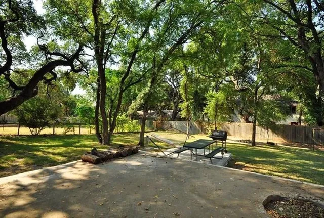 a view of a park with tree s