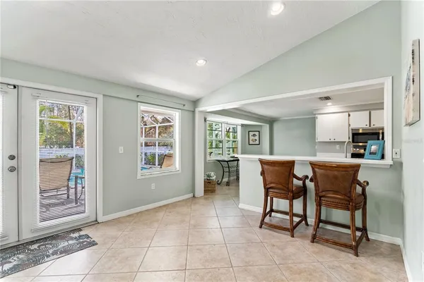 a kitchen with stainless steel appliances a refrigerator stove and sink