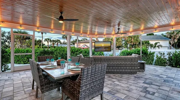 a view of a swimming pool with a patio