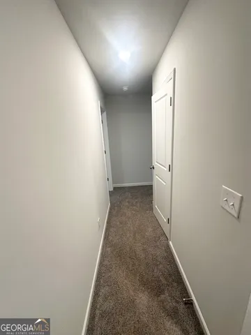 an entryway of a house with hallway