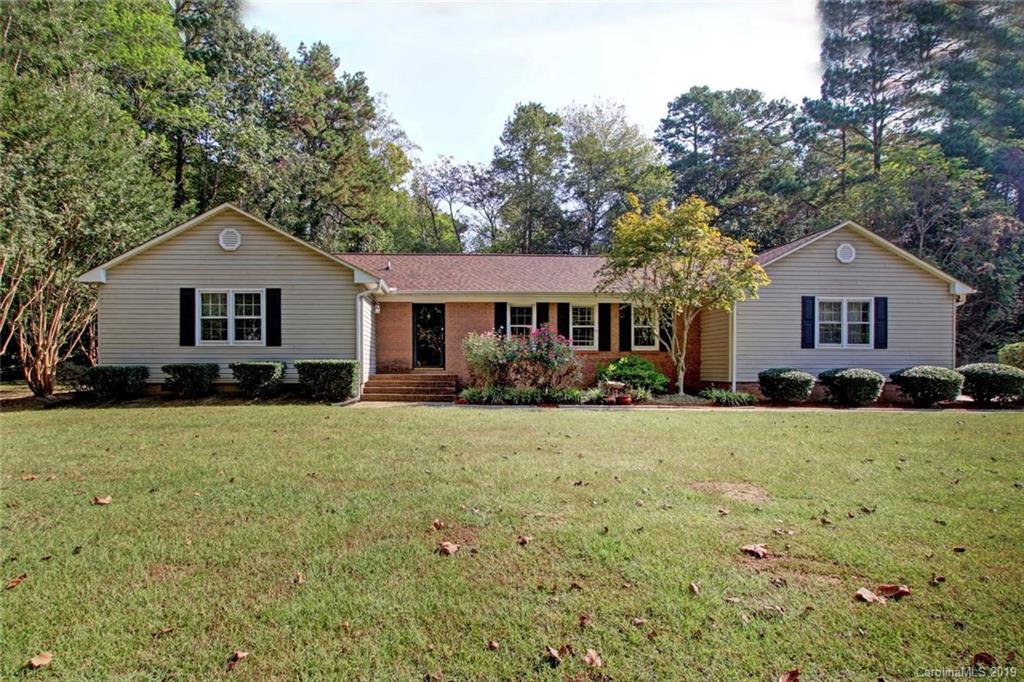 206 Sycamore Road Salisbury, NC 28147 - Photo 2 of 41 a front view of a house with a yard