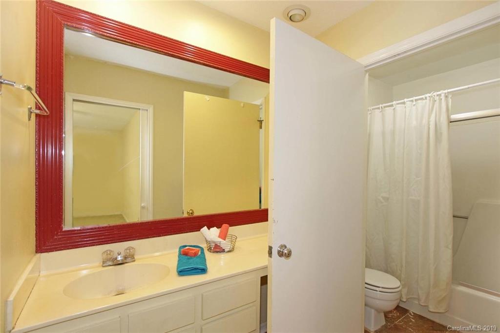 206 Sycamore Road Salisbury, NC 28147 - Photo 23 of 41 a bathroom with a sink and a mirror