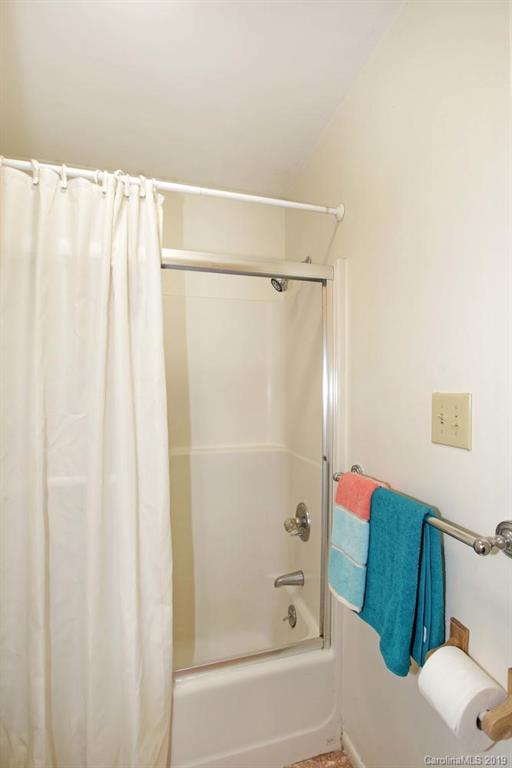 206 Sycamore Road Salisbury, NC 28147 - Photo 24 of 41 a bathroom with a shower curtain and a sink