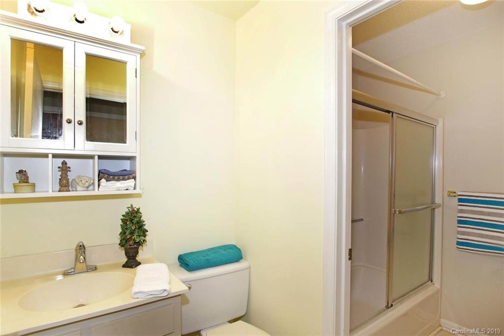 206 Sycamore Road Salisbury, NC 28147 - Photo 26 of 41 a bathroom with a sink and a mirror