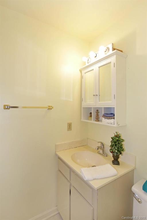 206 Sycamore Road Salisbury, NC 28147 - Photo 27 of 41 a bathroom with a sink and a mirror