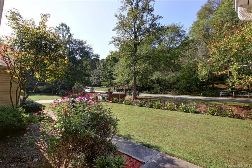 206 Sycamore Road Salisbury, NC 28147 - Photo 4 of 41 a view of a garden with sitting area