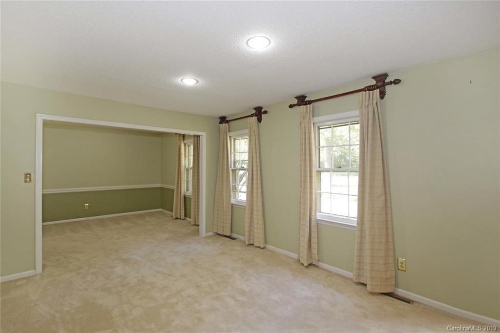 206 Sycamore Road Salisbury, NC 28147 - Photo 6 of 41 an empty room with windows and closet
