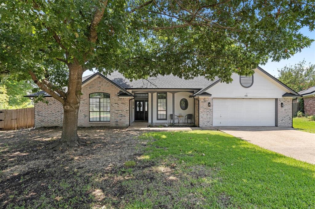 800 Short Line Boulevard Midlothian, TX 76065 - Photo 1 of 39 a front view of a house with a yard and garage