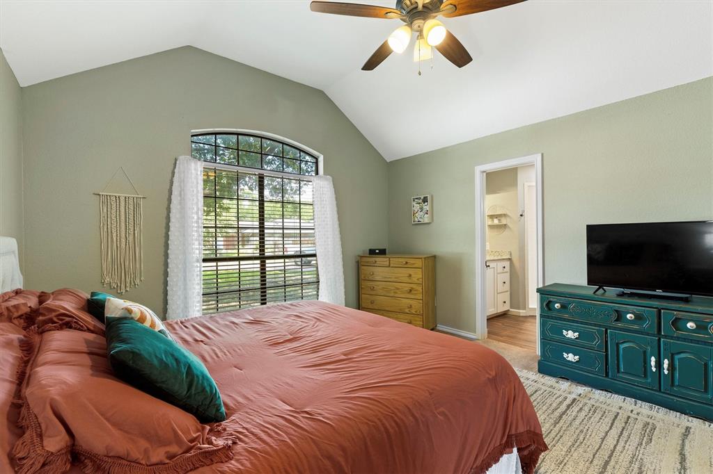 800 Short Line Boulevard Midlothian, TX 76065 - Photo 22 of 39 a bedroom with a bed and a flat screen tv