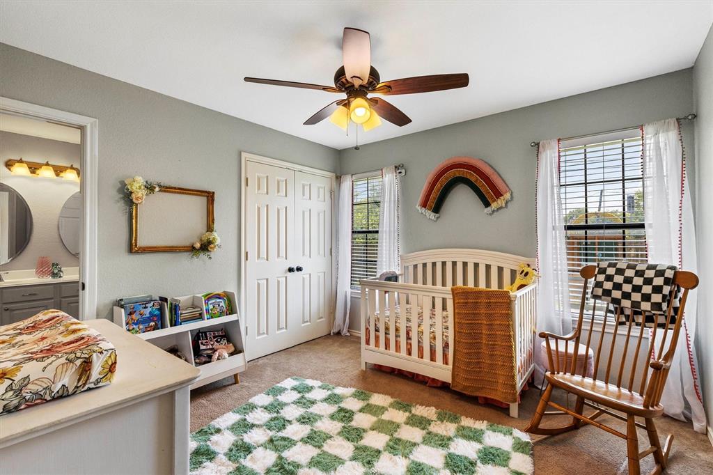 800 Short Line Boulevard Midlothian, TX 76065 - Photo 30 of 39 a bedroom with furniture and a window
