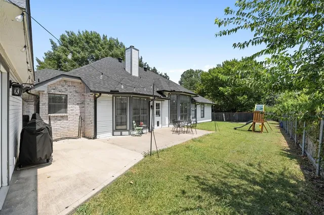 a house view with a garden space