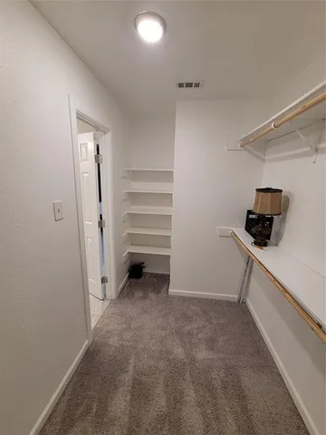 a view of a walk in closet
