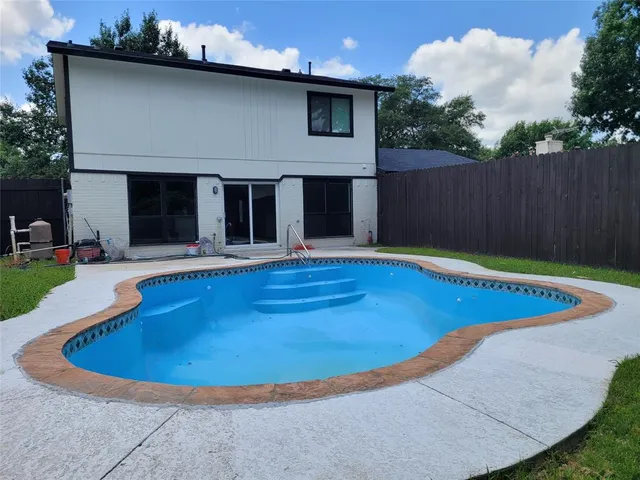 a view of outdoor space yard and swimming pool