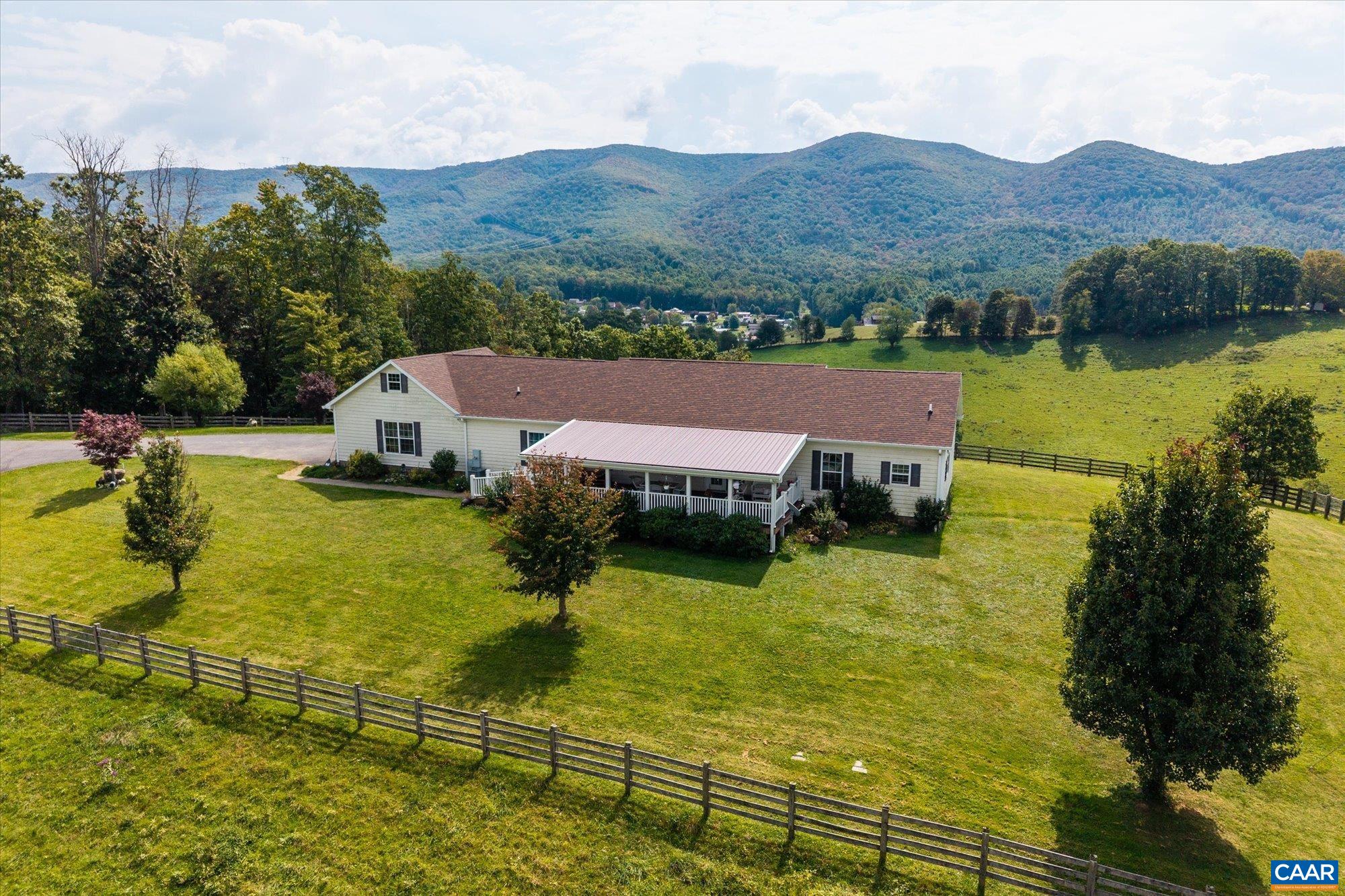 3225 Lynn Hollow Road North Tazewell, VA 24630 - Photo 22 of 62 a view of a lake with a mountain in the background