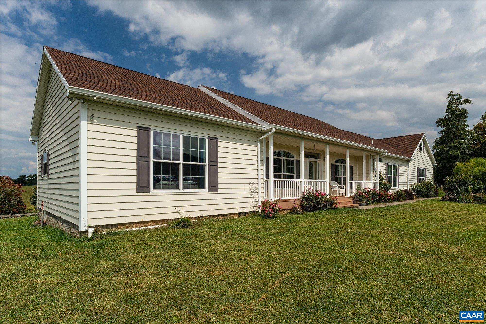 3225 Lynn Hollow Road North Tazewell, VA 24630 - Photo 24 of 62 a front view of a house with a garden