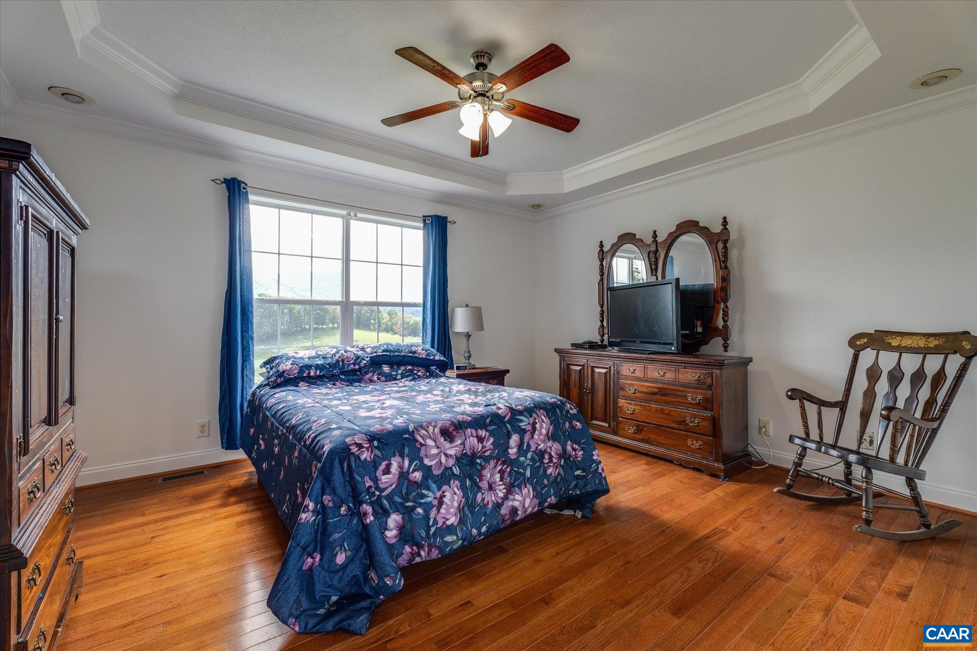 3225 Lynn Hollow Road North Tazewell, VA 24630 - Photo 38 of 62 a bedroom with a bed and wooden floor