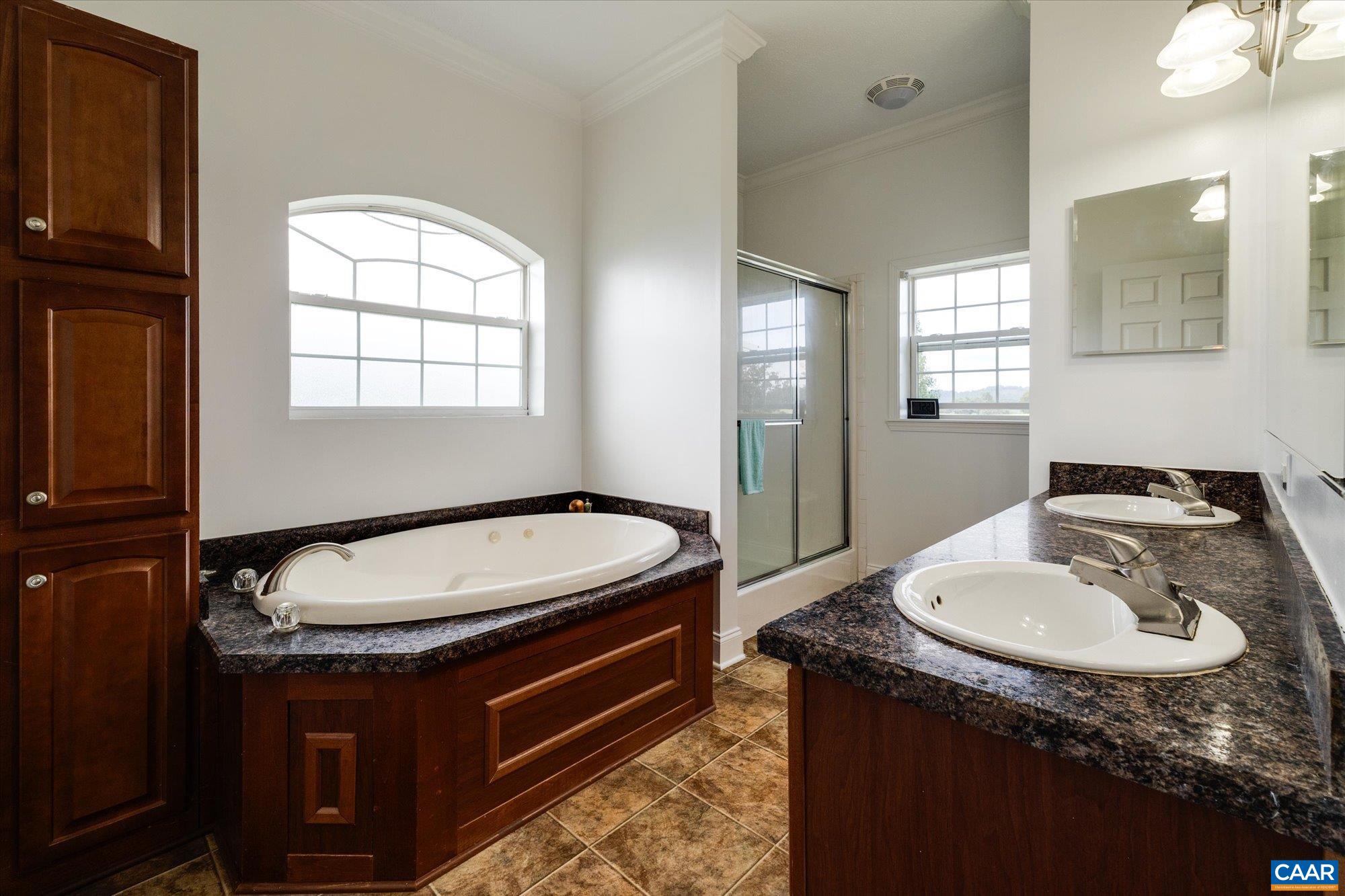 3225 Lynn Hollow Road North Tazewell, VA 24630 - Photo 40 of 62 a bathroom with a sink and a mirror
